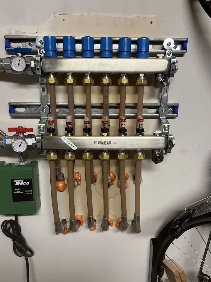 Plumber performing Water Heater Repair at a residential property in Brandon